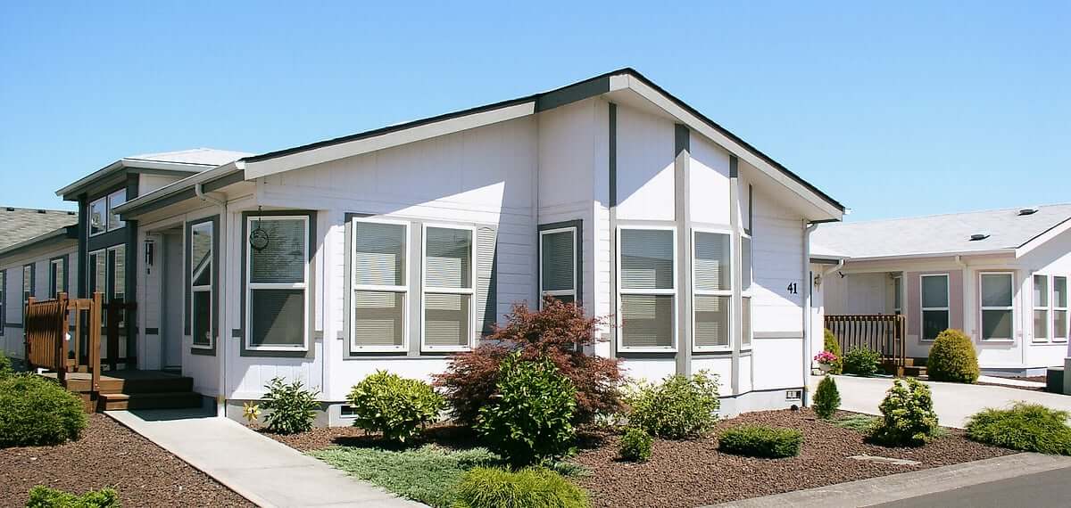 The Chen family at their manufactured home in San Bernardino