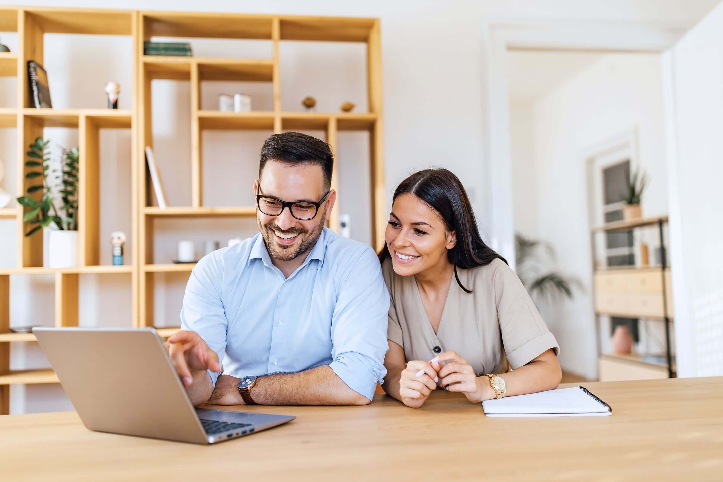 Couple reviewing refinancing options